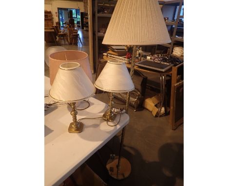 Four table lamps and a standard lamp, with shades