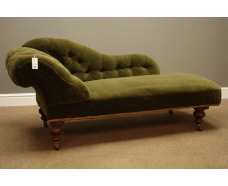 Victorian walnut framed chaise longue, upholstered in deep buttoned green velvet, turned feet with ceramic castors, L160cm