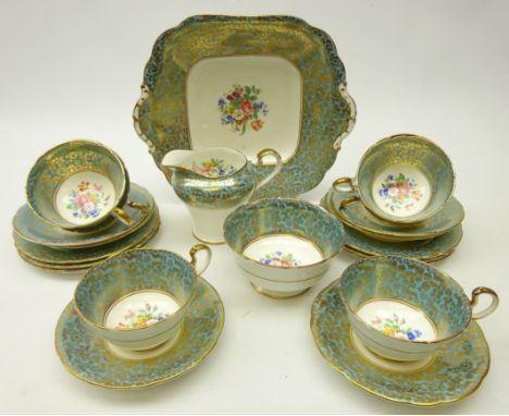 Aynsley tea set for six, central floral panel and gilded floral motif on blue ground (21)   Condition Report   Click here for