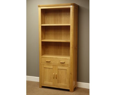 'Agars of Whitby' light oak bookcase with drawer and cupboards, W83cm, H186cm, D34cm   Condition Report   Click here for furt