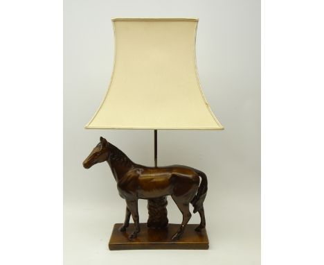 Pottery table lamp in the form of a horse on rectangular base, with shade, H72cm overall   Condition Report   Click here for 