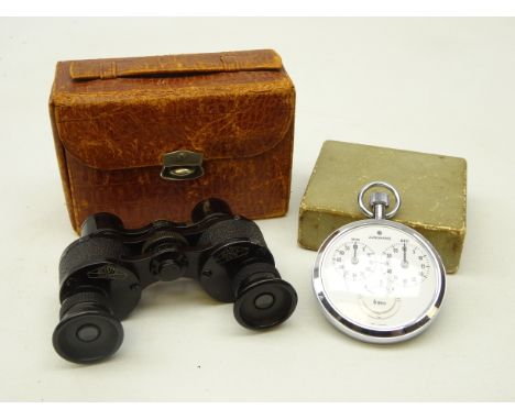 Pair early 20th century Schutz Cassel 3x15 'Baby' binoculars and a Junghans manual wind pocket stop watch (2) Condition Repor