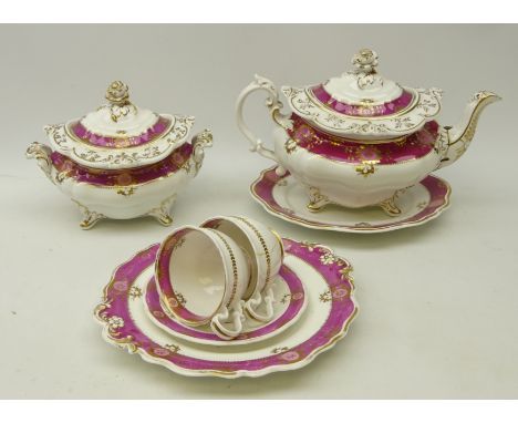 Early 19th century part tea ware comprising teapot & saucer, sucrier, cake plate, two cups and a saucer all with ornate scrol