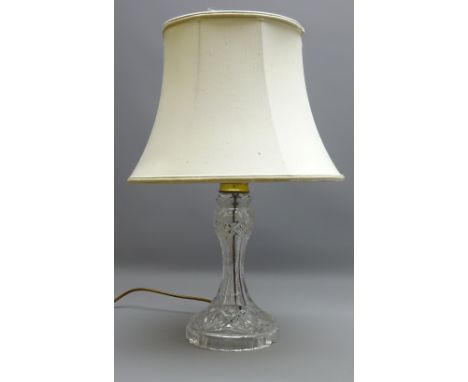 Cut glass table lamp with faceted stem, brass fitting and silk shade, H28cm of main body   Condition Report   Click here for 