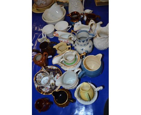 Mixed Lot: Blue and white pearl ware jug, Wedgwood cups and saucers, various 19th Century gilt decorated tea wares etc