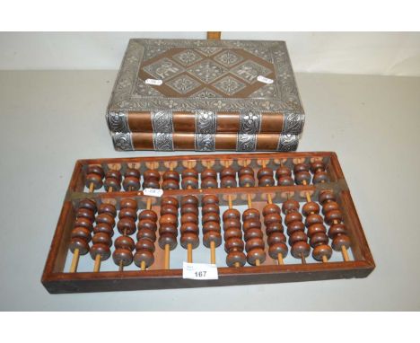 An abacus and a book formed jewellery box