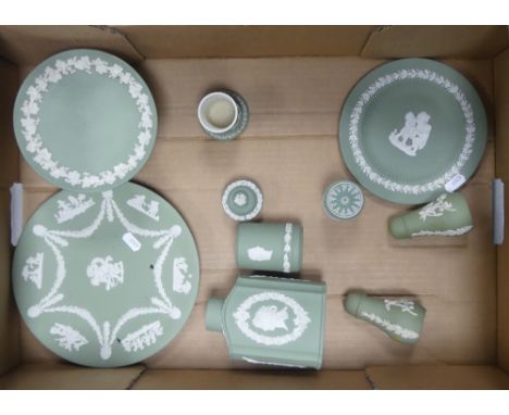 A collection of Wedgwood Sage Green Jasperware to include footed bowl, 2 wall plates, salt and pepper pots, tea caddy (missin