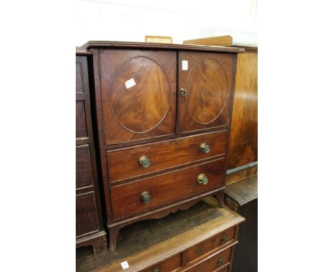 A 19th century mahogany bedside commode.