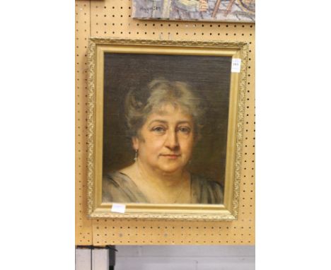 A portrait of a lady, oil on board.