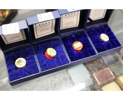 Four small Halcyon Days enamel boxes.