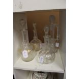 Three decanters and a claret jug.