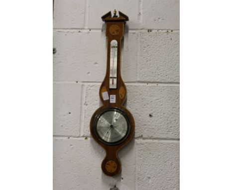 A modern barometer / thermometer with inlaid case.