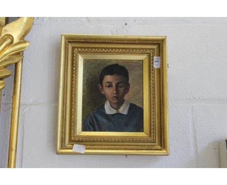 A portrait bust of a young boy wearing a blue jumper, oil on board.