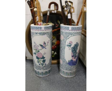 Two Chinese pottery stick stands.