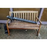 A hardwood garden bench.