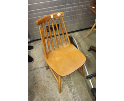 Five stick back chairs.