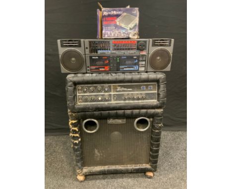 A Kustom 250 amplifier;  similar speaker;  a Philips Tandem portable stereo. 