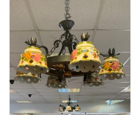 A pair of wood and metal ships wheel six branch light fittings, ceramic shades, approx 80cm diameter. 