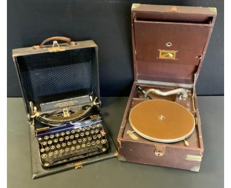 A His Masters Voice portable wind-up model 101 Gramophone, serial No 29631, brown case;  a Remington model 5 typewriter. 