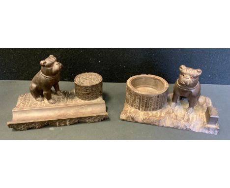 A Black Forest type desk top inkwell as a seated Bulldog tree trunk covered well, pen tray front;  19.5cm wide;  another desk