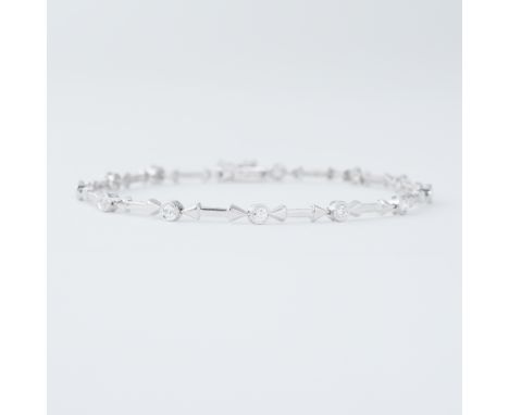 An 18ct white gold bracelet with 'arrow' style links interspaced with round brilliant cut diamonds in a rub-over setting, tot
