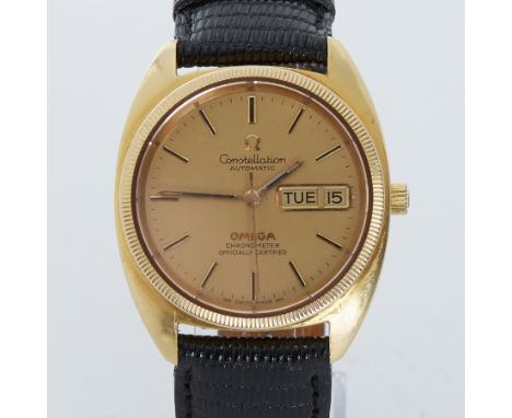 Omega, an 18ct yellow gold Omega Constellation automatic chronometer, 34mm, on black leather strap, currently running but win