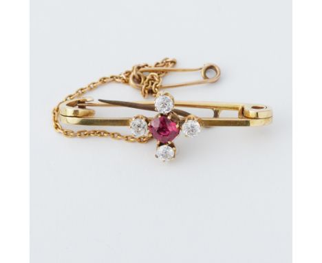 A yellow gold brooch set with a round cut ruby, approx. 0.35 carats and four old rose cut diamonds, total diamond weight appr