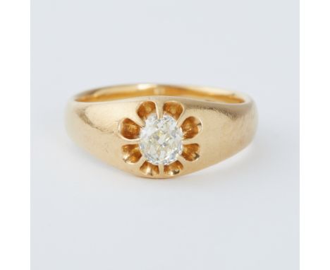 An antique 18ct yellow gold ring set with an old rose cut diamond in a 'gypsy' style setting, (diamond slightly oval in shape