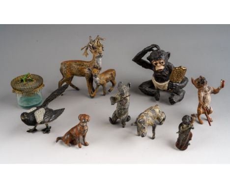 A collection of eight vintage Austrian and modern cold painted bronze miniature figures of animals, birds and a child, includ