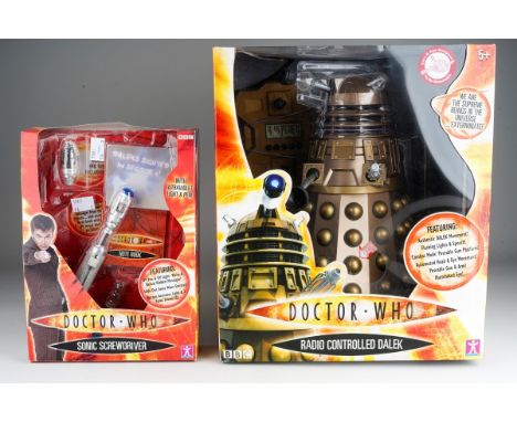 A boxed Character Doctor Who radio controlled 12 inch gold coloured Dalek, no. 01629, Dalek movement, flashing lights and spe