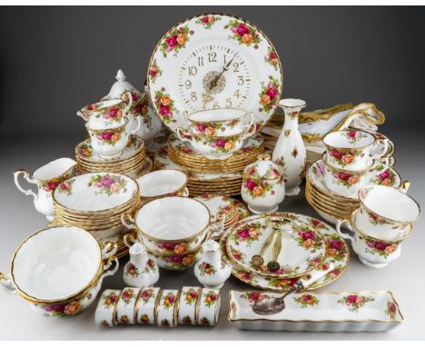 A Royal Albert Old Country Roses extensive six place setting dinner service including dinner plates, fruit bowls, dessert bow