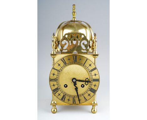 A late 20th century brass lantern clock, with Swiss key wind movement, bell strike, bears presentation plaque to rear door, h