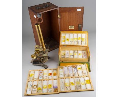A cased Broadhurst, Clarkson &amp; Co brass and black lacquered microscope, in very dusty condition and case of mid 20th cent