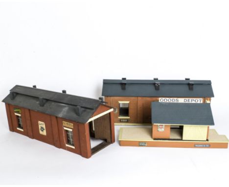 A Collection of Bassett-Lowke or Similar Lineside Buildings, including two different single-line engine sheds (both 18in long