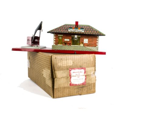 A Boxed American Flyer 0 Gauge No 97 Freight Station, with tinprinted brickwork to building on steel base with crane, origina