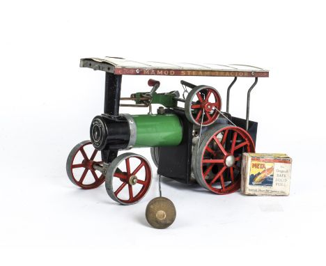 A Mamod Spirit-fired TE1a Traction Engine,  in the regular green/red livery, with spirit burner, scuttle, water level plug an