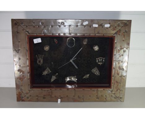 LARGE WALL CLOCK IN METAL CASE, THE NUMERALS PICKED OUT IN SILVER METAL OBJECTS