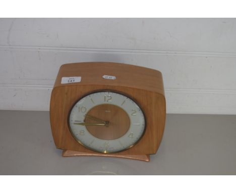 SMITHS CLOCK IN PALE WOODEN CASE