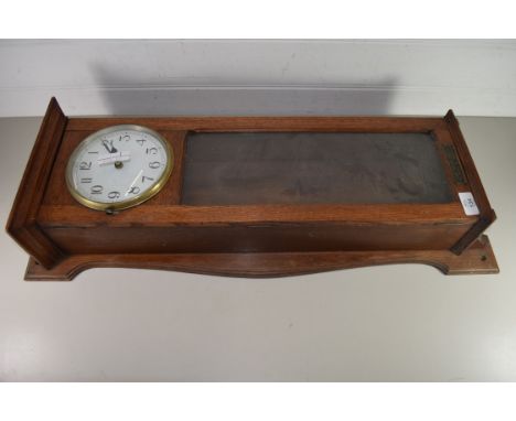 CLOCK IN OAK CASE WITH PLAQUE "SILENT ELECTRIC CLOCK, GOSWELL RD, LONDON"