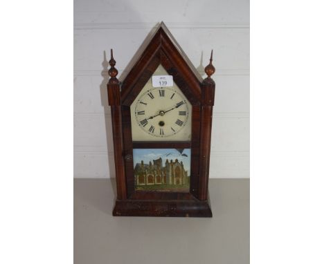 CLOCK IN WOODEN ARCHED CASE