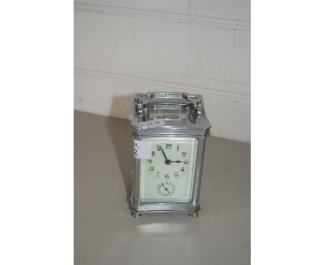 CARRIAGE CLOCK WITH SILVER METAL MOUNTS