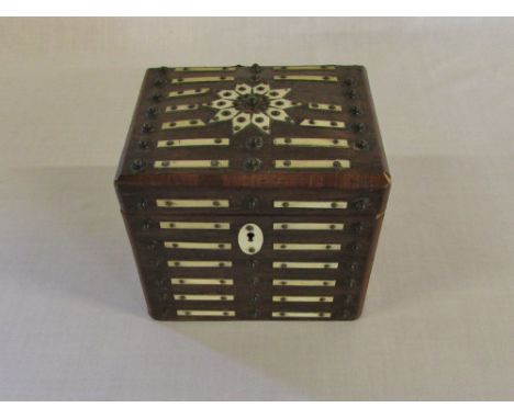 An unusual 19th Century rosewood tea caddy with ivory embellishments H 13 cm L 16 cm D 13 cm