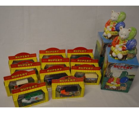 11 Lledo The Rupert Collection diecast vehicles & 2 ceramic money boxes
