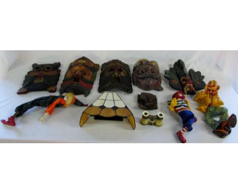 Various carved masks, ceramic clowns, opera glasses etc
