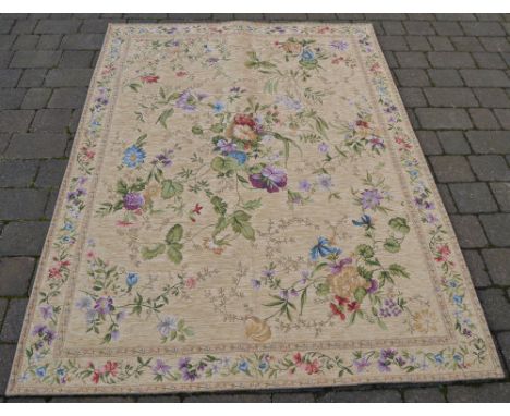 Gold ground Flemish tapestry with an all over floral design 8ft x 5ft