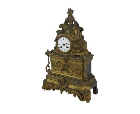 An attractive 19th Century French figural Mantle Clock, the top surmounted with elegant young lady resting, inset with circul