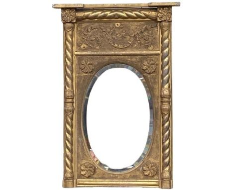 A 19th Century Irish gilt Pier Mirror, with inverted breakfront cornice above a leaf moulded sanded frieze above an oval beve