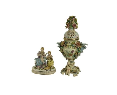 A flower encrusted Sitzendorf style porcelain&nbsp;Pot Pourri Vase &amp; Cover, decorated with flowers, the pierced cover wit