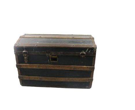 A 19th Century dome top wooden and metal bound Travel Trunk. (1) 