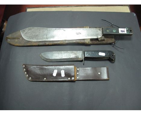 A 1987 British Army Survival Knife with Scabbard, with a  British Army Machete with scabbard.